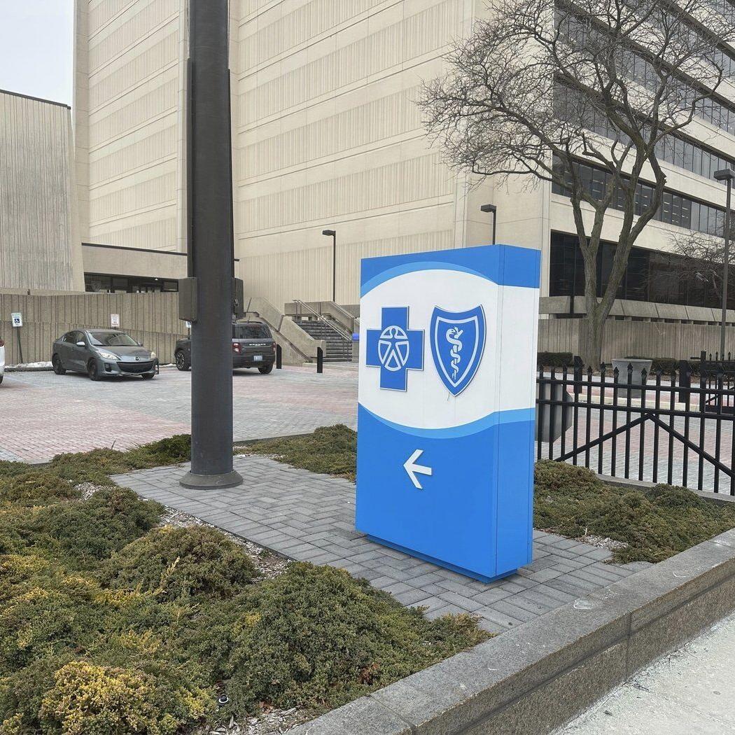 Major Michigan insurer in talks to settle lawsuits over fired workers and COVID-19 vaccine